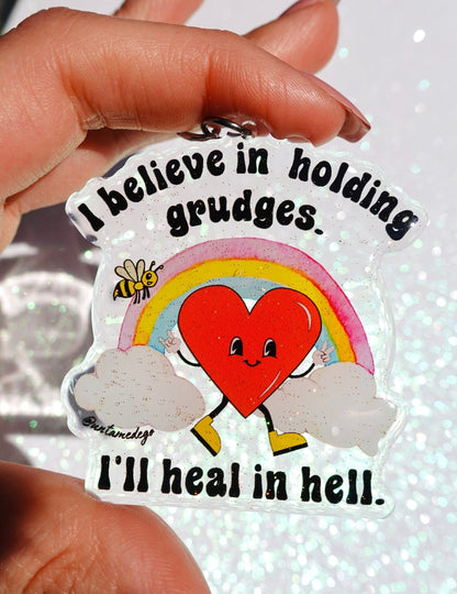 Funny Heart keychain charm with red alien, rainbow, clouds, and quote text
