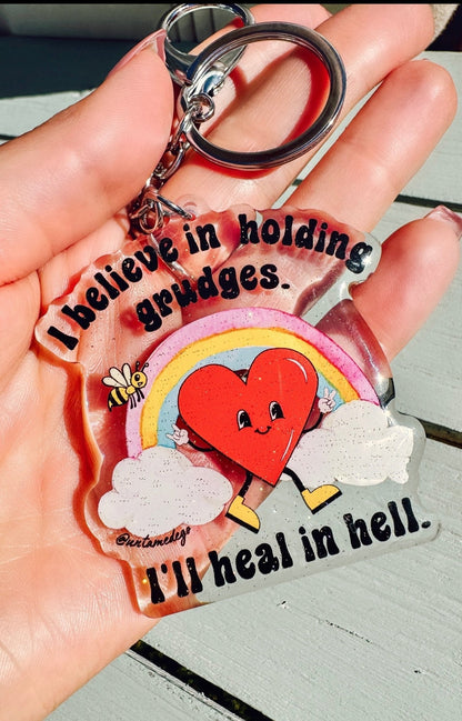 Funny Heart keychain charm with silver ring, red alien, rainbow, clouds, and quote text