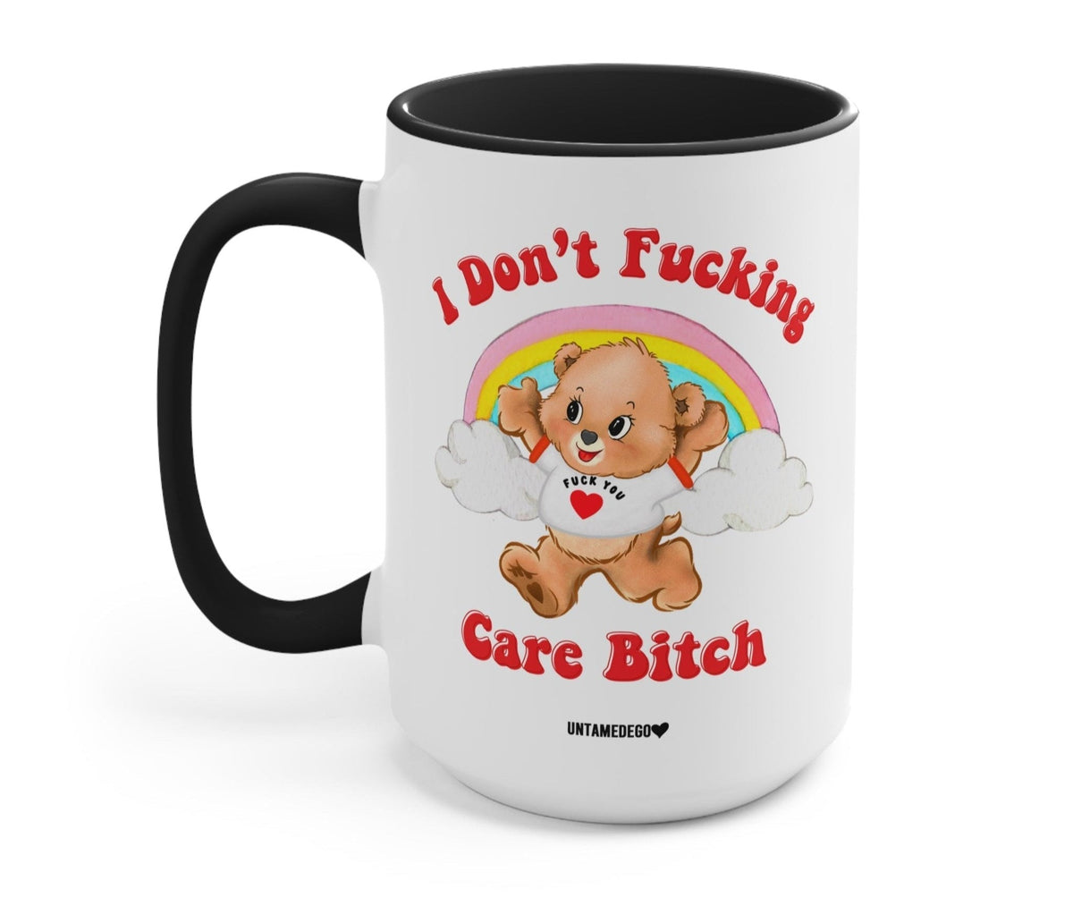 Funny "I Don't Fucking Care Bitch Lolly The Bear" — White mug with black interior and handle; rainbow bear graphic with bold text