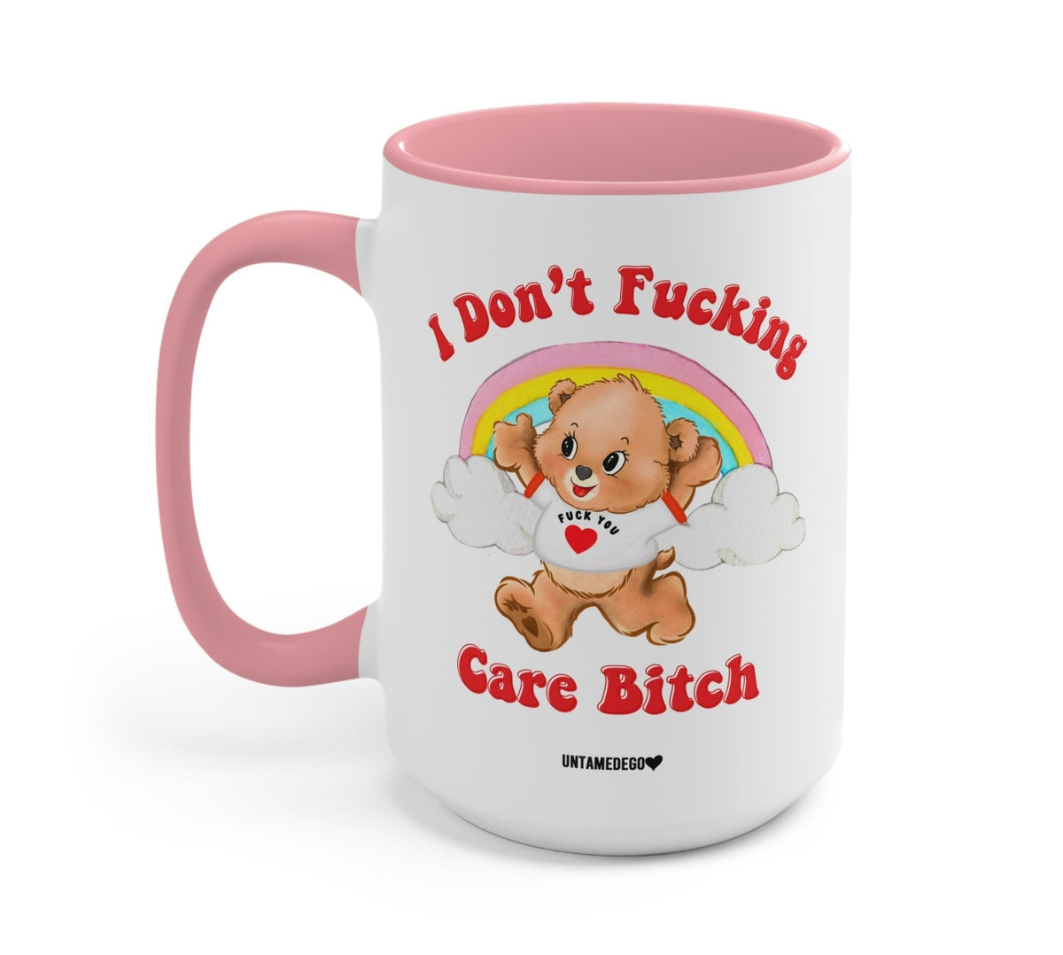 Funny "I Don't Fucking Care Bitch Lolly The Bear" — White mug with pink interior and handle; rainbow bear graphic with bold text