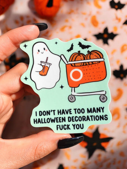 Funny Halloween ghost sticker: mint outline, orange pumpkin cauldron, bats, and 'FUCK YOU' text