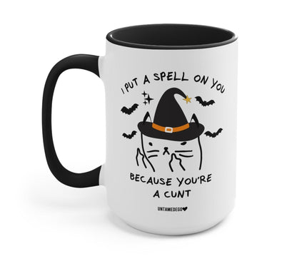 Funny "I Put A Spell On You Mean Kitty Halloween" — White ceramic mug with black handle, witch cat graphic, 'Because you're a cunt' text