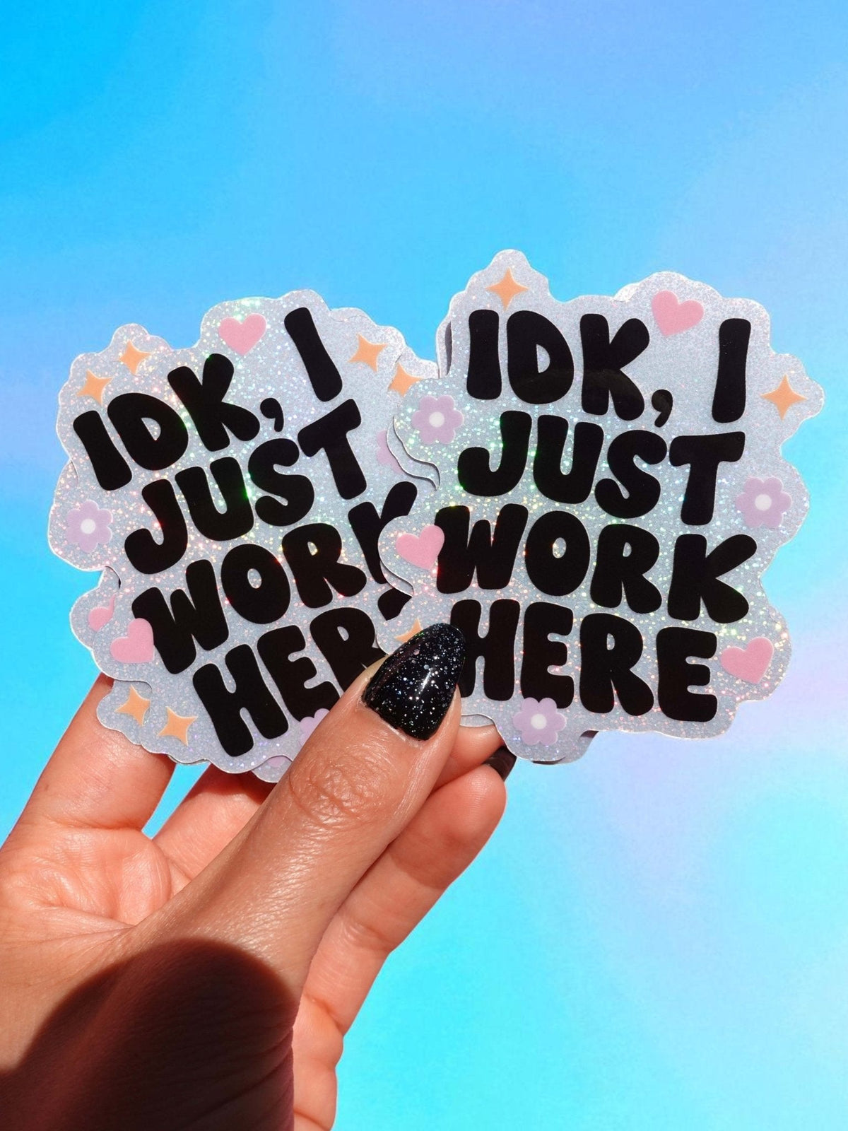 Funny Pair of glitter work-slogan stickers reading "IDK, I JUST WORK HERE" with pink hearts