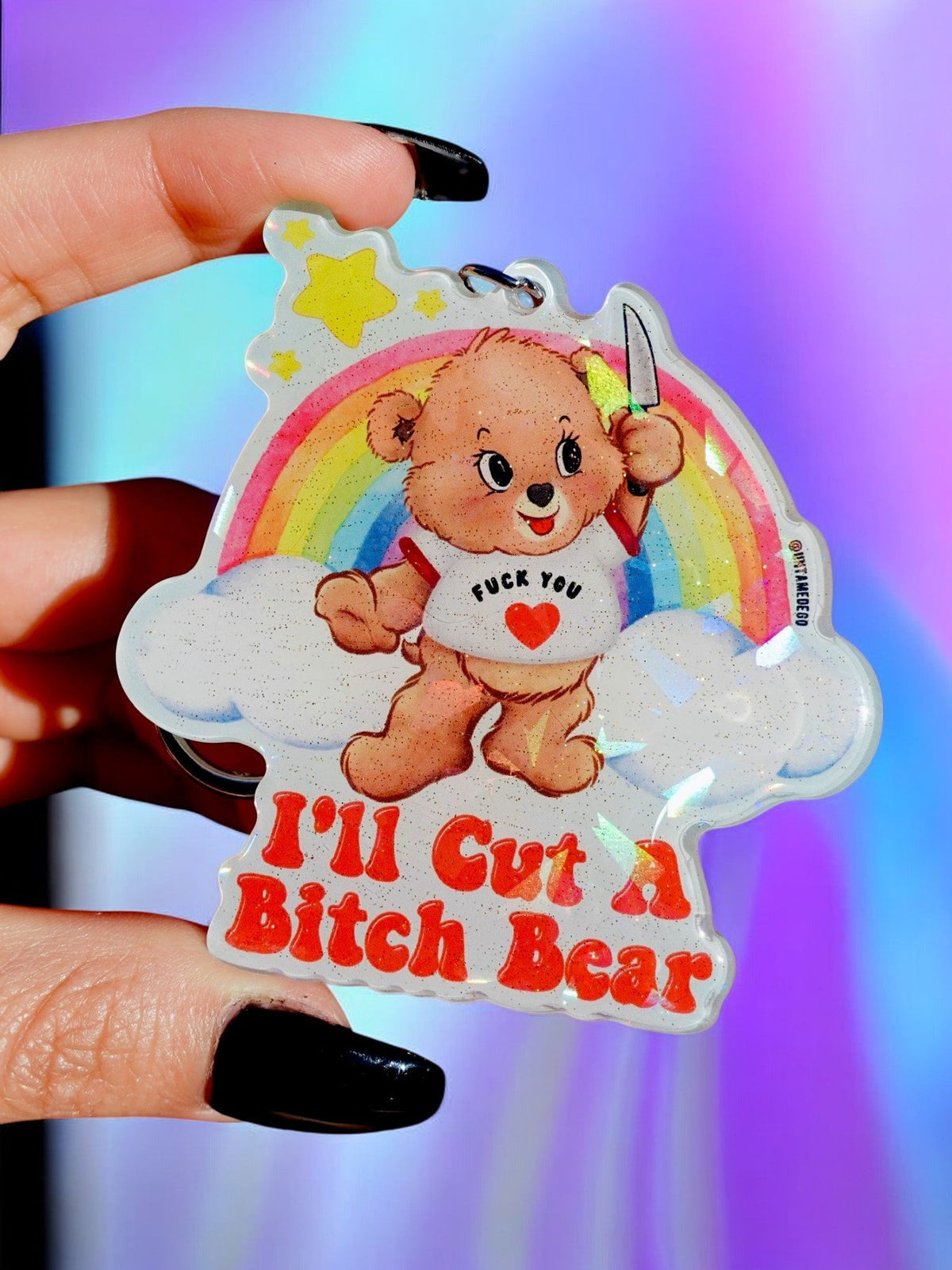 Funny Holographic bear keychain with rainbow graphic, heart charm, and star accents
