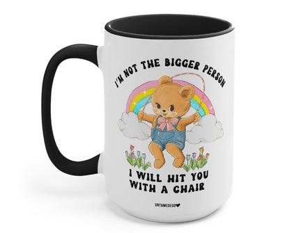Funny "I'm Not The Bigger Person I Will Hit You With A Chair" — Black-handle ceramic mug with angel bear rainbow graphic and bold quote text