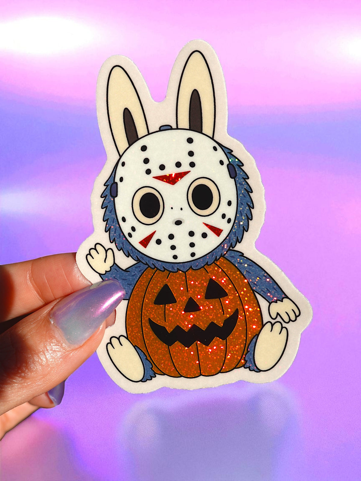 Funny Glitter vinyl bunny monster sticker with blue fur and orange pumpkin face
