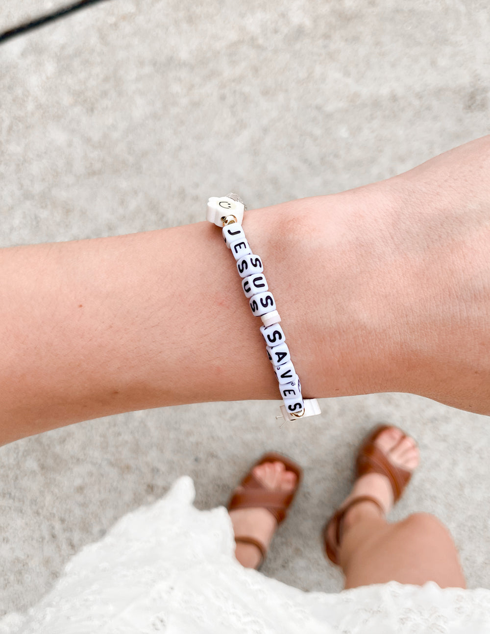 Elevated Faith Christian Jewelry Bracelet featuring beads spelling 'Jesus Saves' for a stylish statement of faith