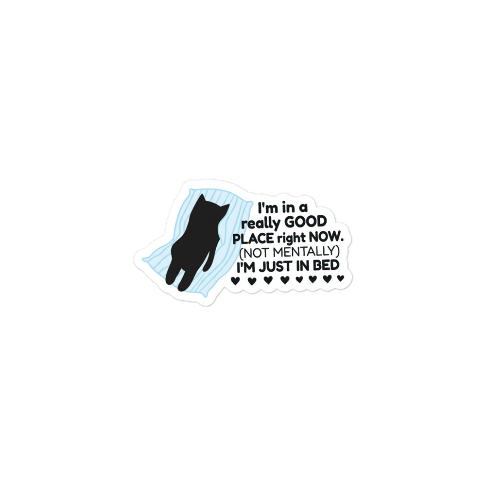 Funny Bubble-free cat sticker with blue bed graphic and 'I'm in a really GOOD PLACE right NOW.'