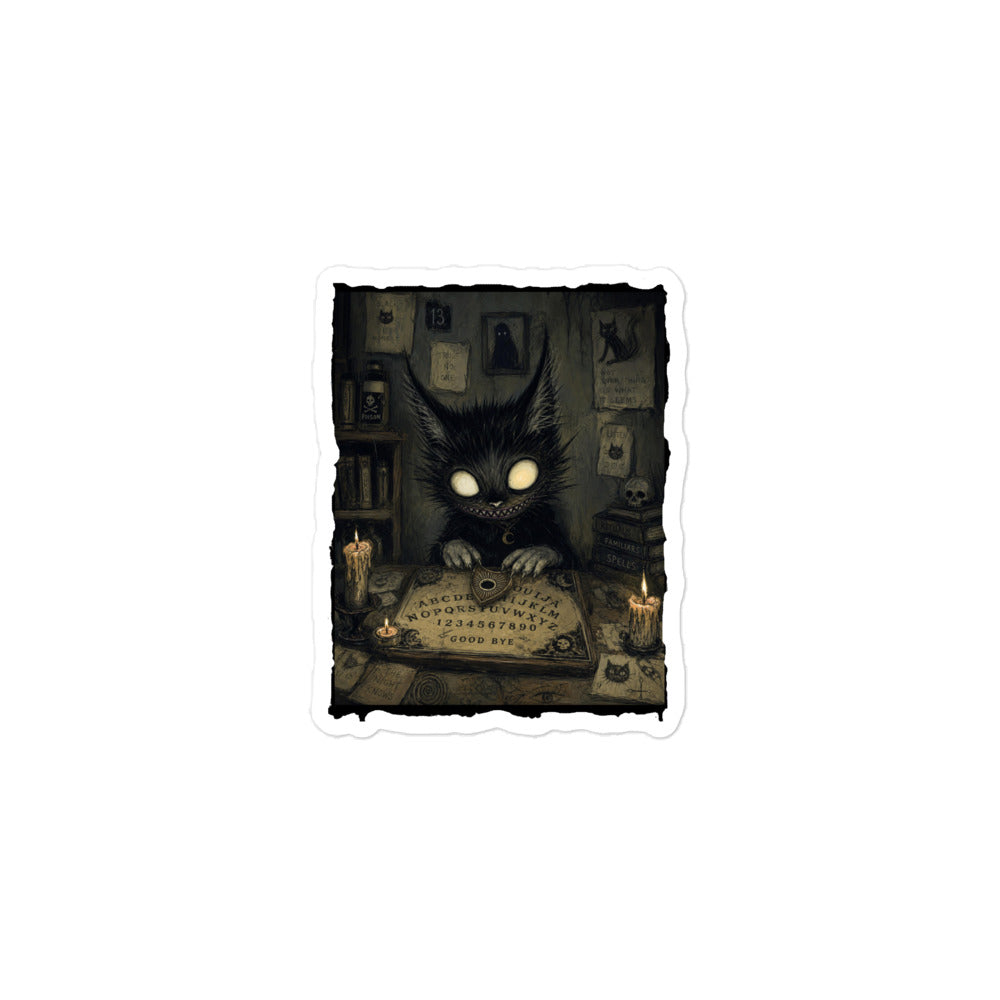 3 x 3 inch 'Free Readings' goth sticker featuring a wide-eyed black cat creature at a Ouija board surrounded by candles
