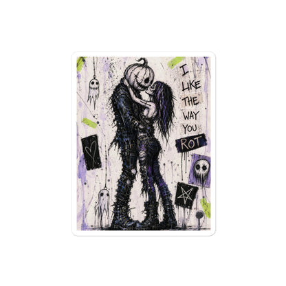 4 x 4 inch 'I Like The Way You Rot' goth sticker featuring a pumpkin-headed zombie kissing a purple-haired goth girl, with the words "I like the way you rot"