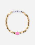 Elevated Faith Christian Jewelry Bracelet with gold beads and a pink heart charm that says LOVED