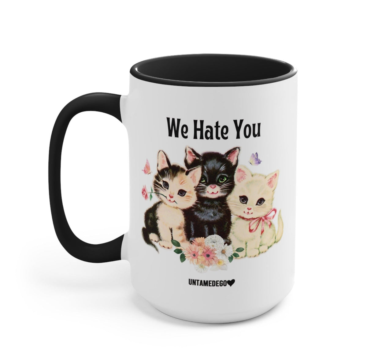 Funny "Mean Kitties" — 15 oz white mug with black handle and interior; colorful cats and “We Hate You” text