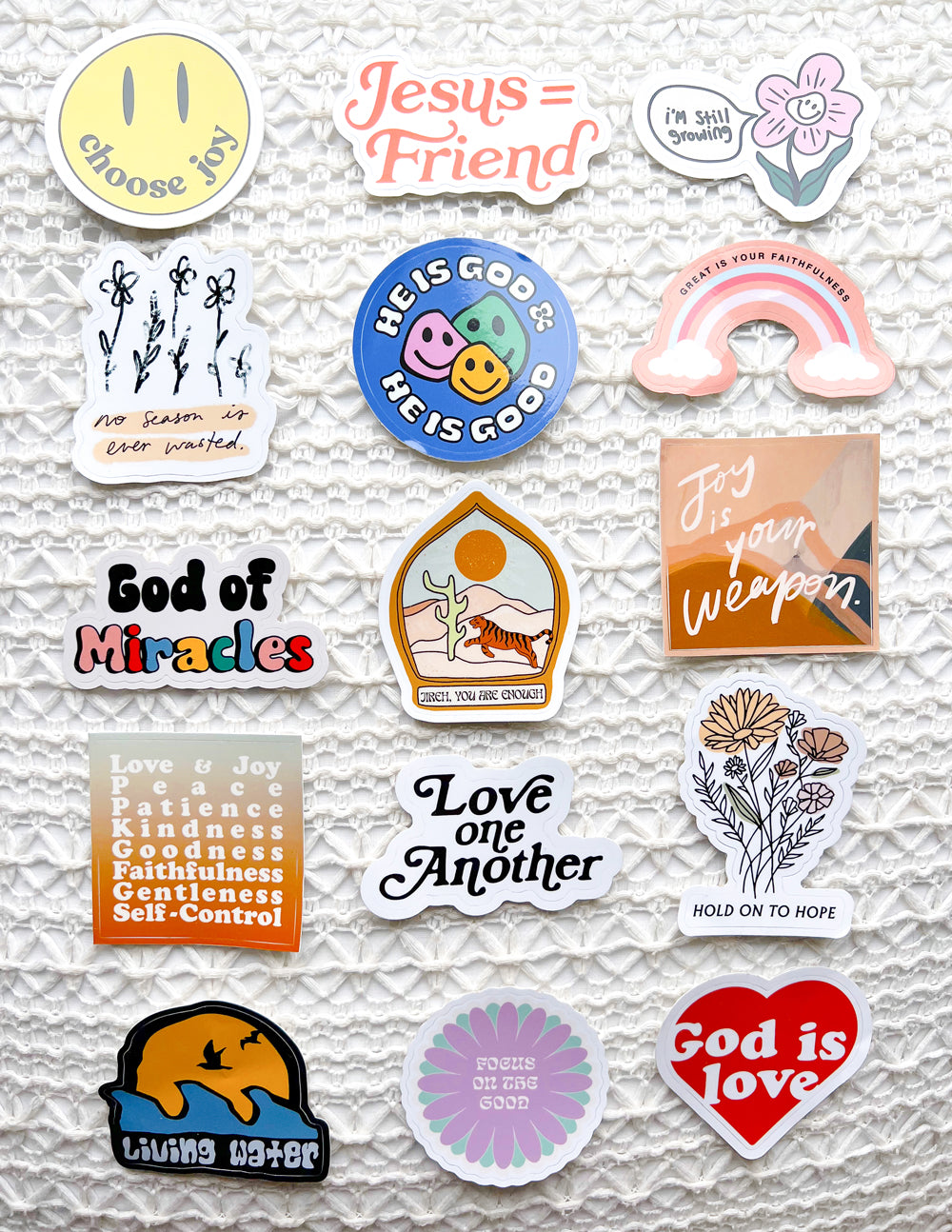 Variety of Christian Stickers featuring inspirational quotes and colorful designs for faith expression