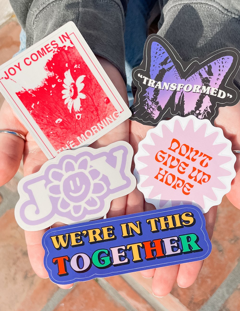 A set of colorful Christian Stickers featuring motivating messages like 'Don't Give Up Hope' and 'We're in This Together'
