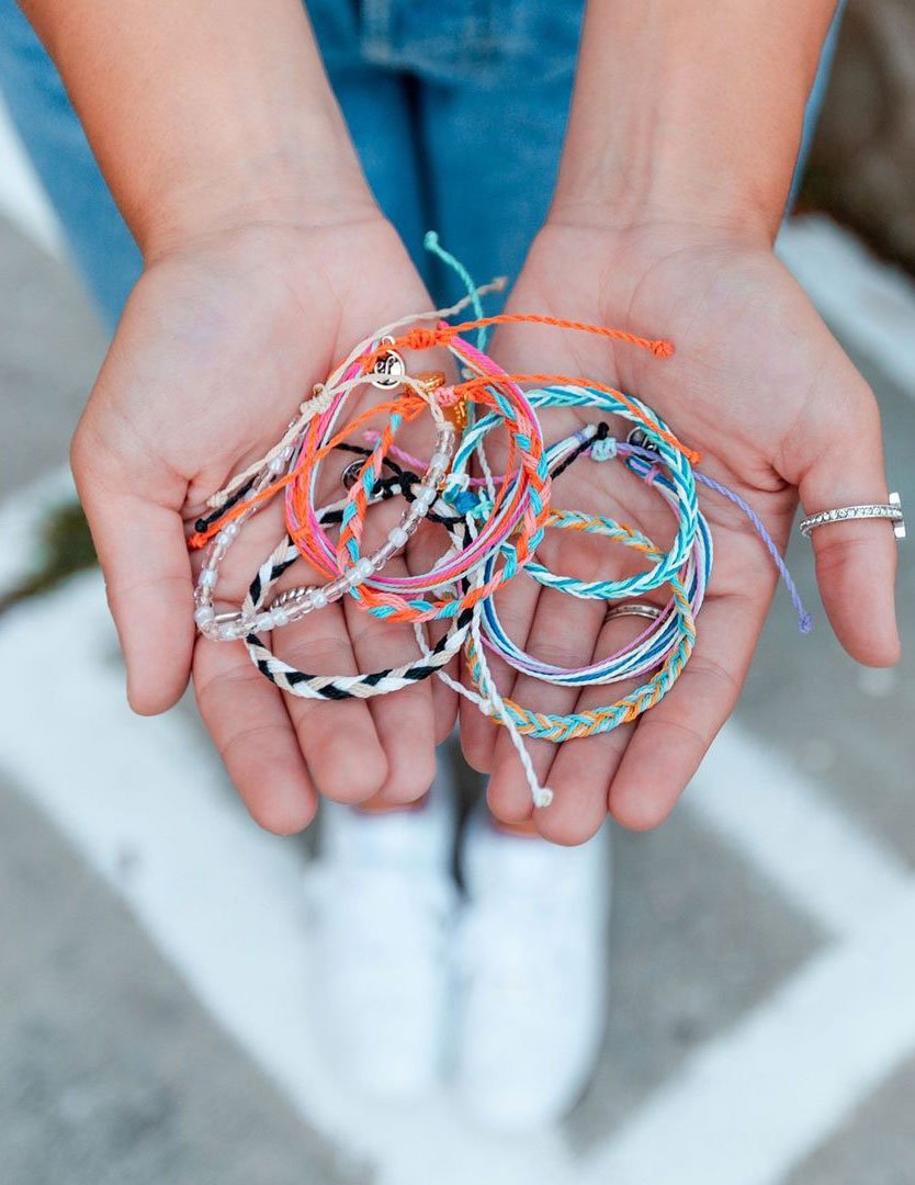Various String Bracelets from Elevated Faith representing Christian Jewelry Bracelet styles and colors