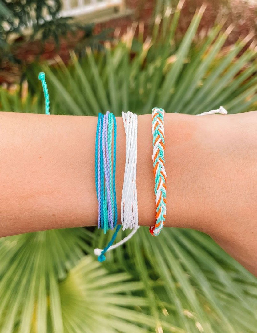 Elevated Faith Christian Jewelry Bracelet Collection in Various Colors and Styles on a Wrist