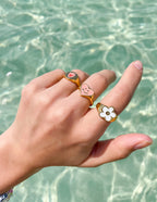 Three Gold Rings featuring Heart and Flower Designs, ideal Christian Jewelry for meaningful style