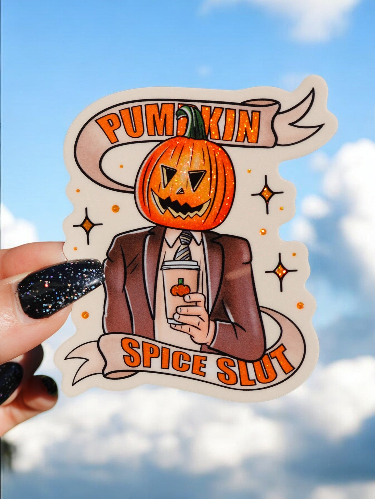 Funny Halloween sticker: pumpkin-headed character in suit holding drink, 'Pumpkin Spice Slut'