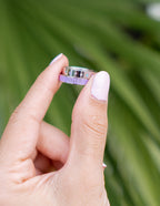 Elevated Faith Christian Jewelry Love Ring in a Hand with Nature Background