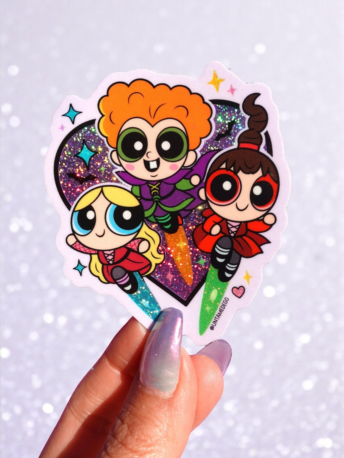 Funny Round holographic sticker with three anime-style girls in superhero outfits