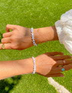 Elevated Faith Christian Jewelry Bracelet featuring white beads with inspirational letters for positive messages