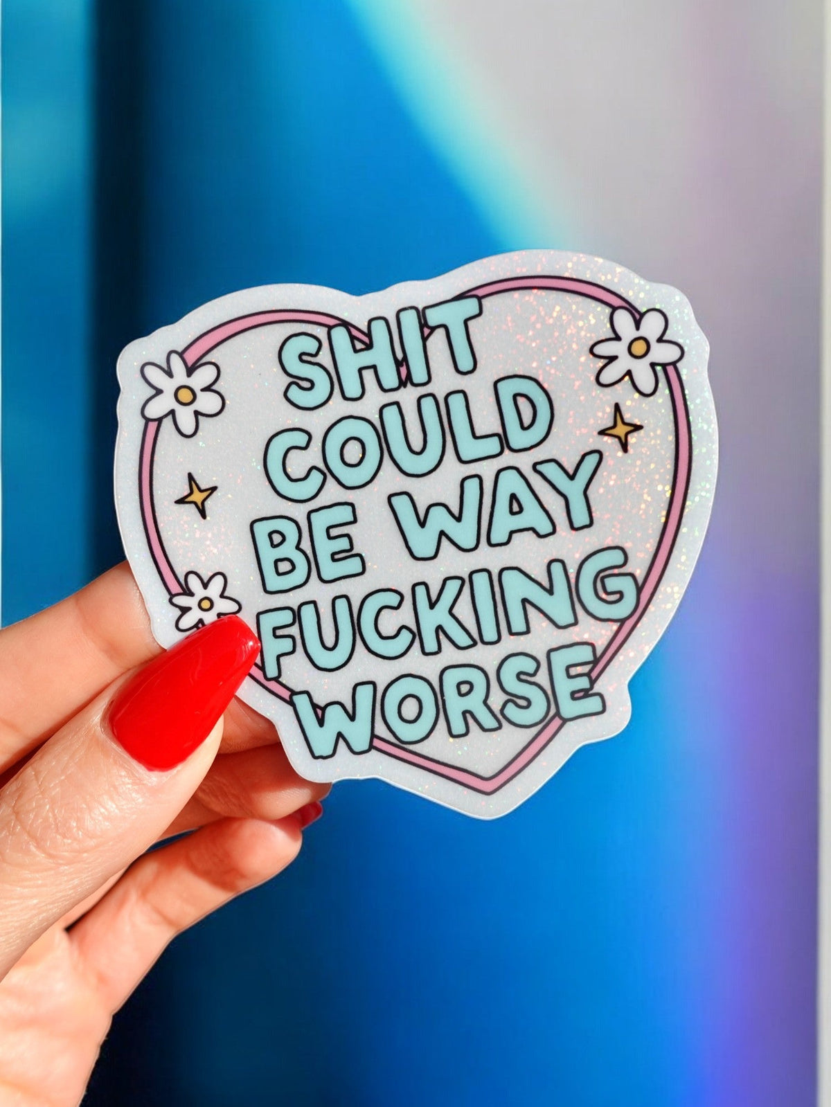 Funny Heart-shaped sticker with colorful glitter text: SHIT COULD BE WAY FUCKING WORSE