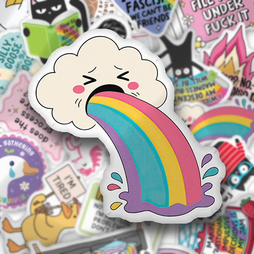 Cloud-shaped custom pillow with rainbow graphic and smiling face