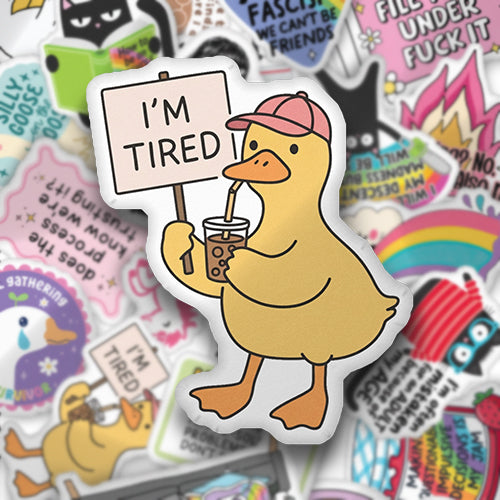 Custom-shaped I'm Tired duckling pillow with attached character badge illustration