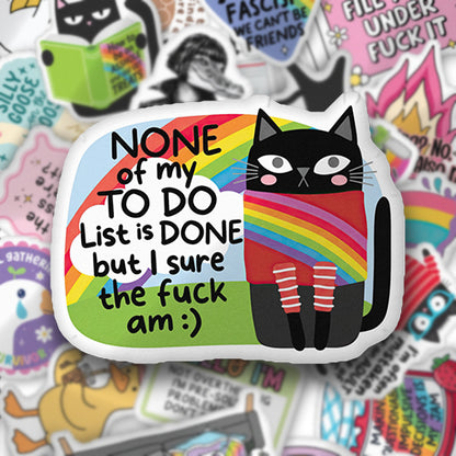 Custom-shaped decorative pillow with black cat holding rainbow flag and colorful text