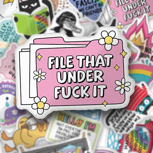 Custom folder-style throw pillow with pink ‘FILE THAT UNDER FUCK IT’ text graphic