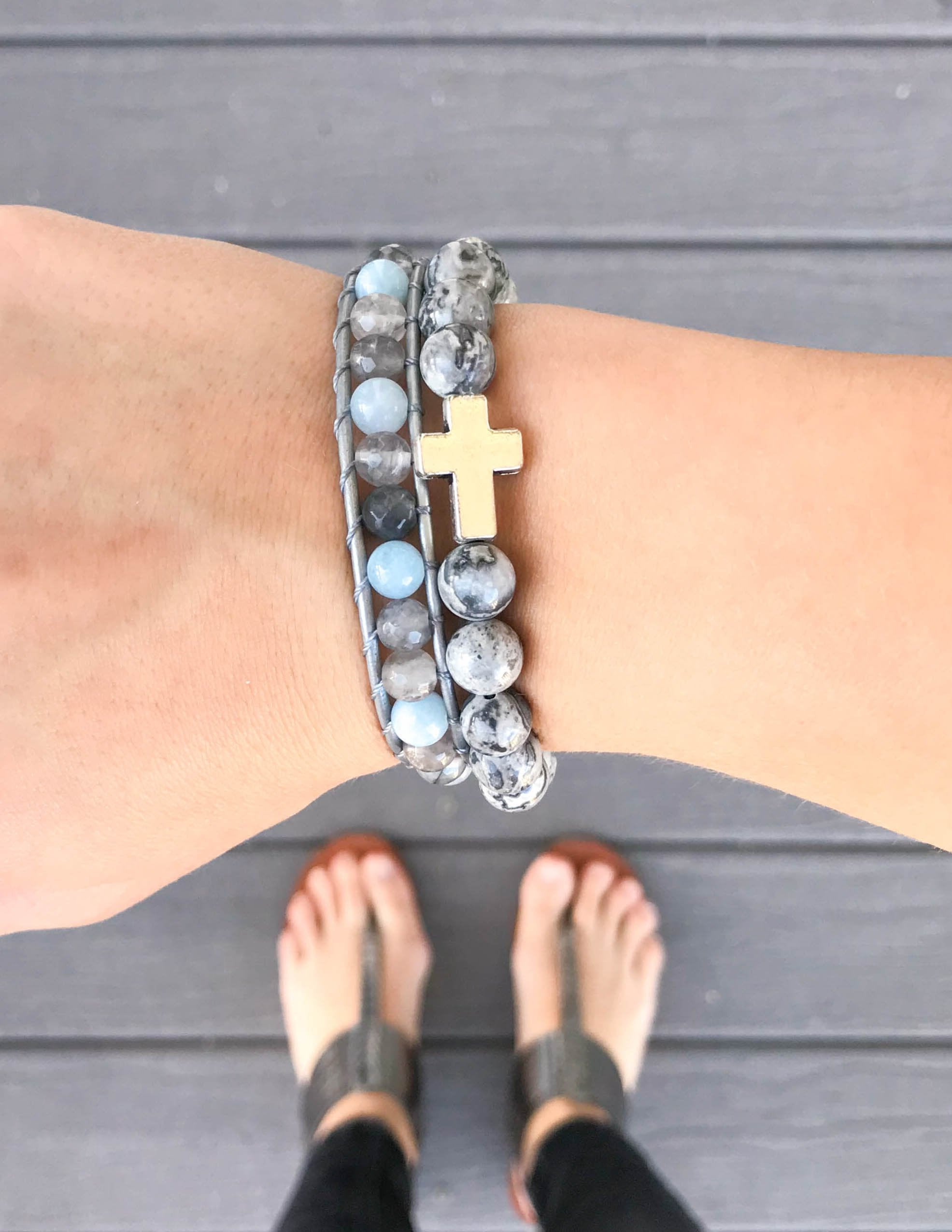 Stone Christian Jewelry Bracelet featuring a gold cross charm and soothing blue and gray beads