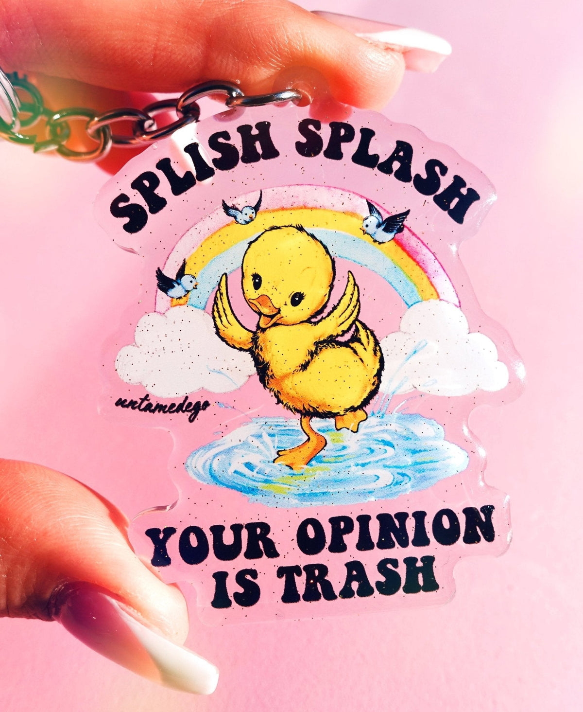 Funny Acrylic keychain with cartoon chick, rainbow splash, and 'YOUR OPINION IS TRASH' text.