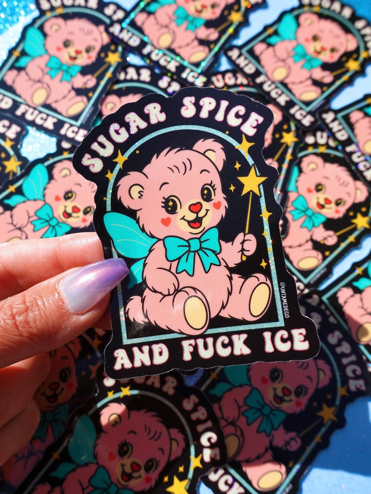 Funny Bear graphic sticker with turquoise bow; 'SUGAR SPICE' and 'AND FUCK ICE' wording