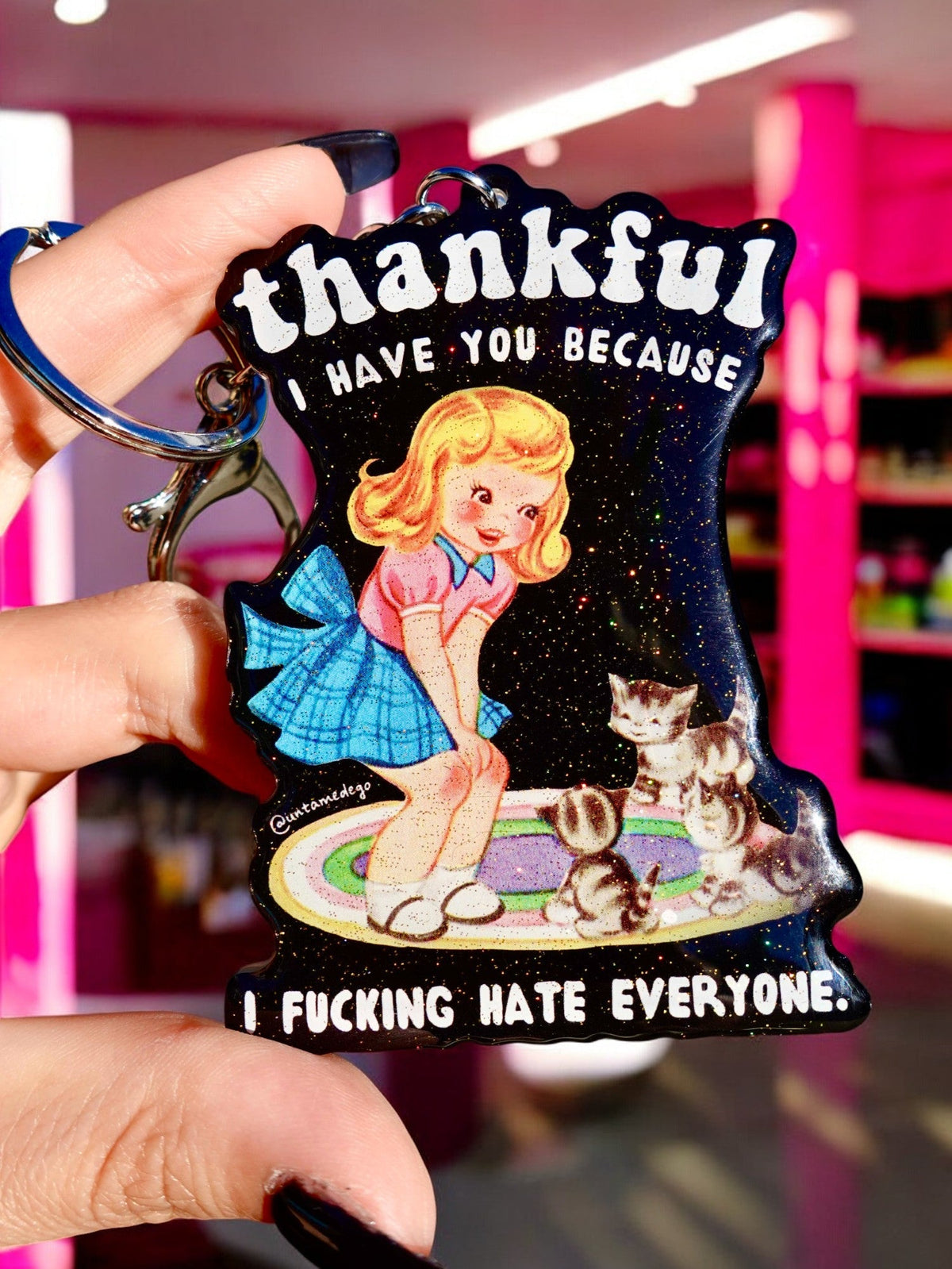 Funny Black glitter keychain charm with girl, cat, and 'I FUCKING HATE EVERYONE.'