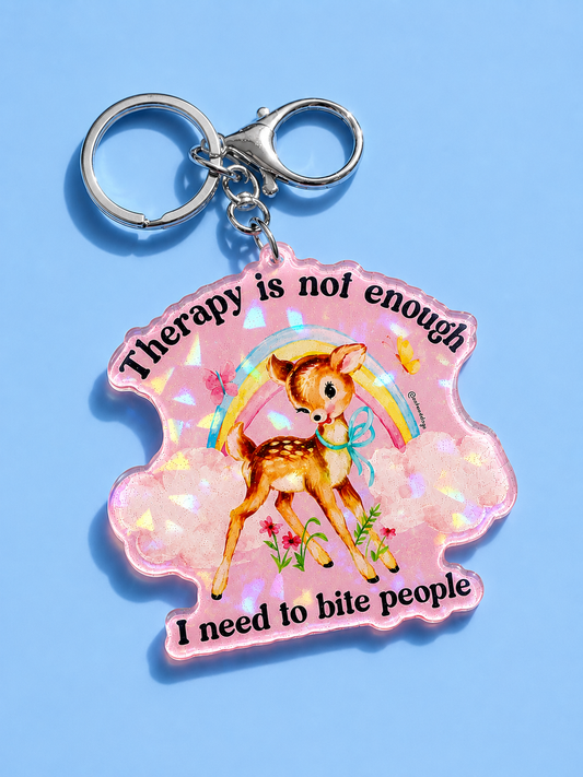 Funny Holographic keychain with a dog illustration and text, attached to metal split rings