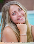Elevated Faith Christian Jewelry Bracelet with letter beads shown on a smiling model by the pool