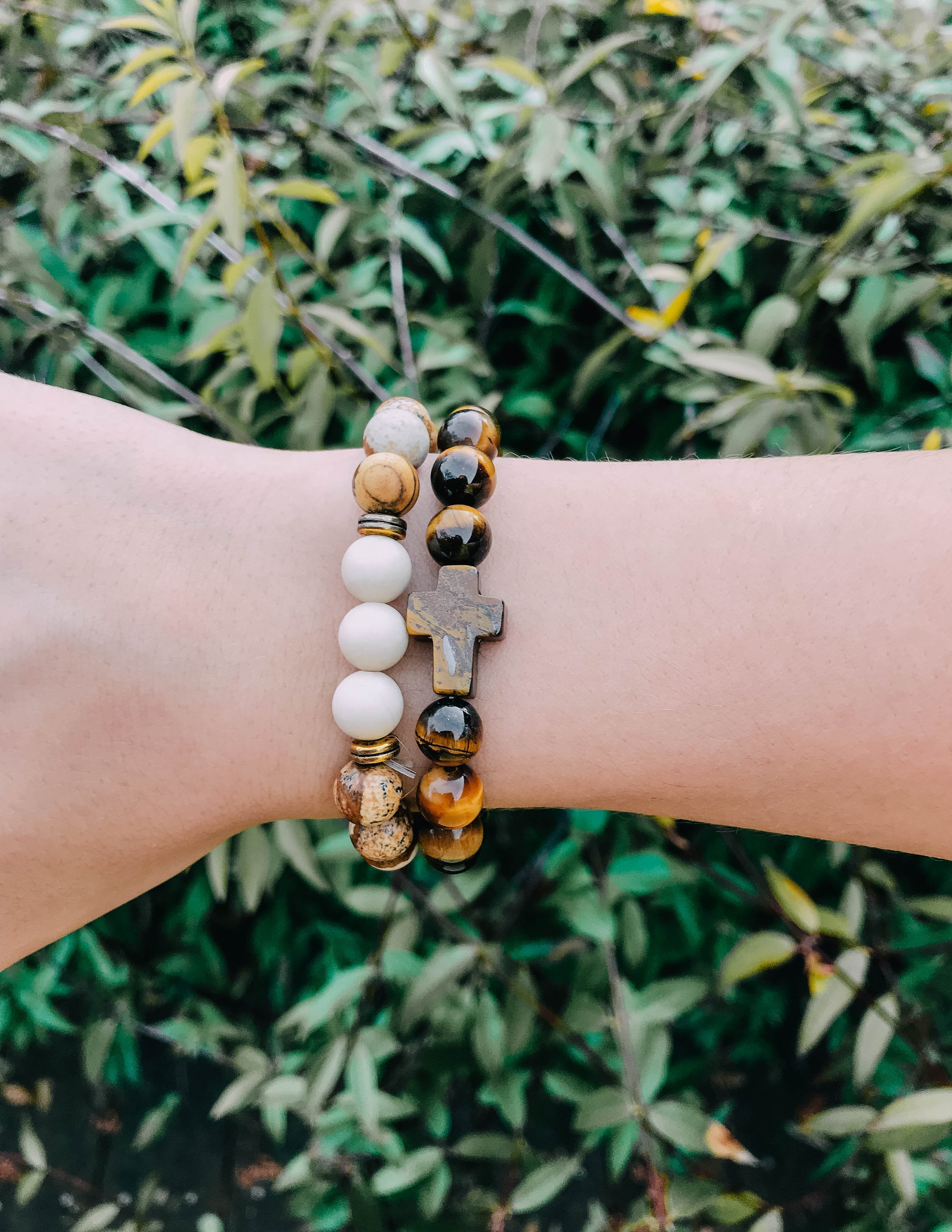 Elevated Faith Christian Jewelry Bracelet with natural stones and cross accent on a wrist