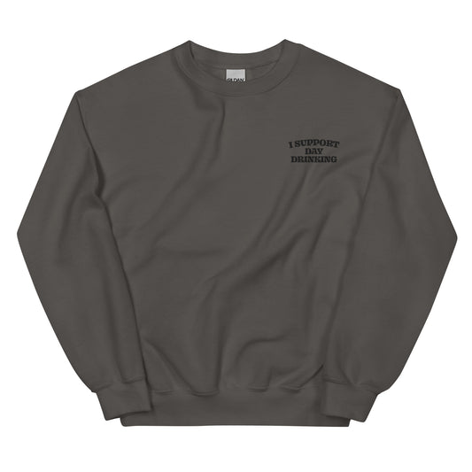 Unisex crewneck sweatshirt in dark heather with small embroidered slogan on chest