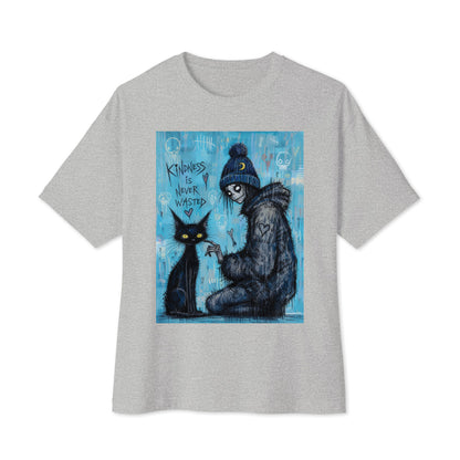 Athletic heather oversized boxy tee with the 'Kindness Is Never Wasted' goth graphic: a girl in a moon beanie petting a black cat on a blue background, with the words "Kindness is never wasted"