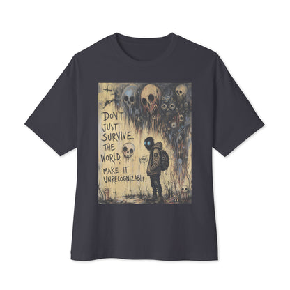 Dark grey oversized boxy tee with the 'World Changer' goth graphic: a hooded figure beneath looming skulls, with the words "Don't just survive the world, make it unrecognizable"