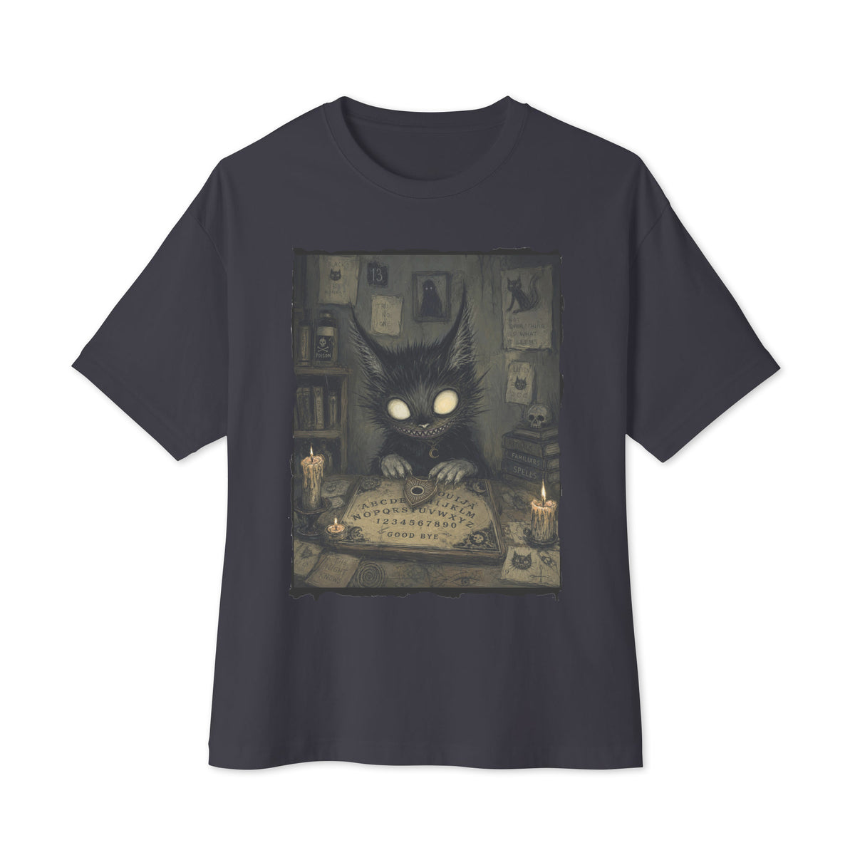 Dark grey oversized boxy tee with the 'Free Readings' goth graphic: a wide-eyed black cat creature at a Ouija board surrounded by candles