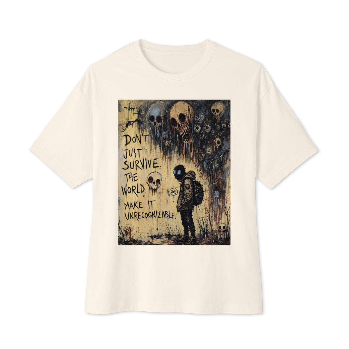 Natural oversized boxy tee with the 'World Changer' goth graphic: a hooded figure beneath looming skulls, with the words "Don't just survive the world, make it unrecognizable"