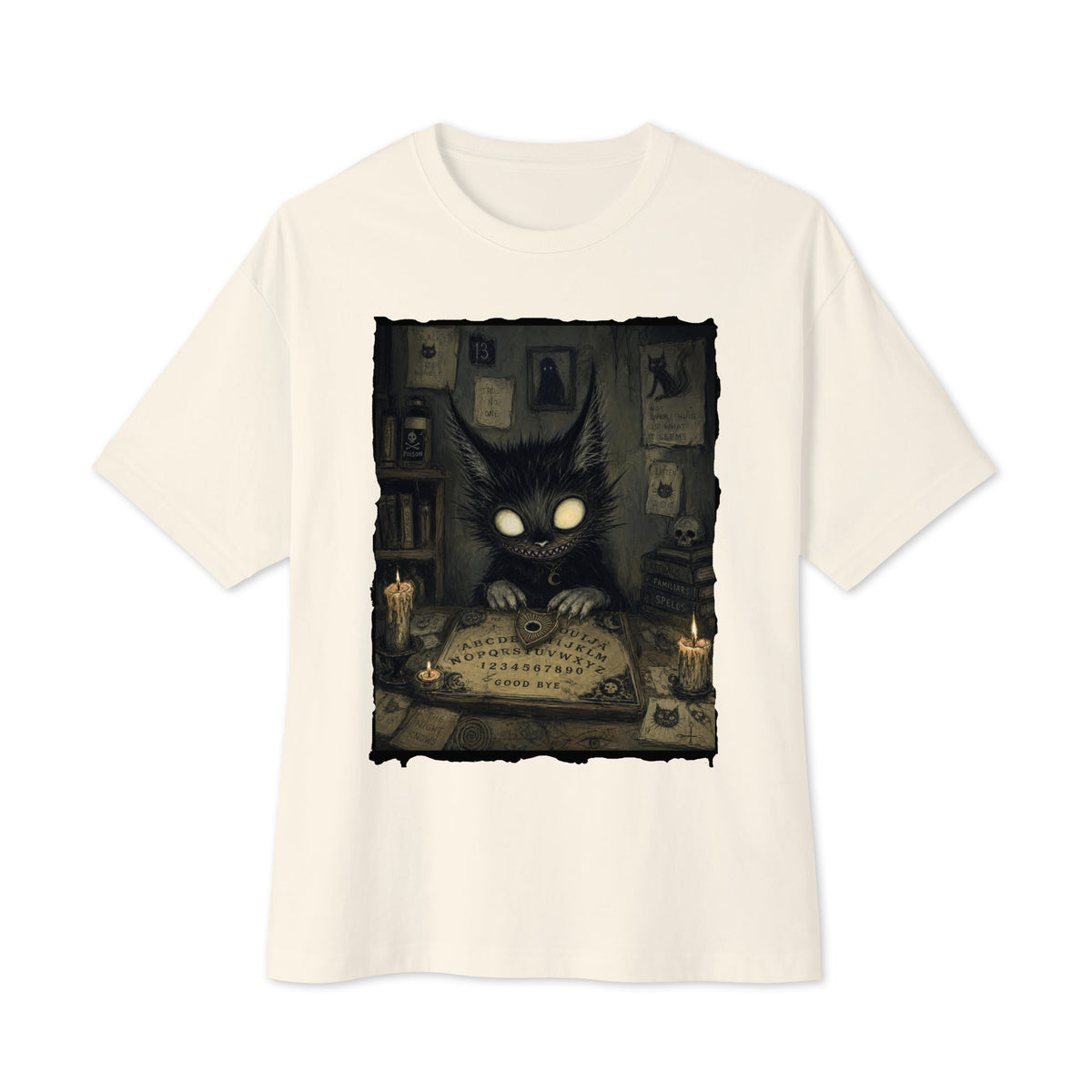 Natural oversized boxy tee with the 'Free Readings' goth graphic: a wide-eyed black cat creature at a Ouija board surrounded by candles