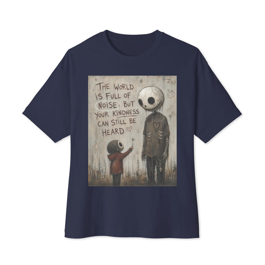 Navy oversized boxy tee with the 'Stay Kind' goth graphic: a tall skull-faced figure and a small child holding a flower, with the words "The world is full of noise, but your kindness can still be heard"