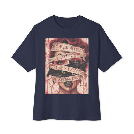 Navy oversized boxy tee with the 'Just Something Real' goth graphic: a red-haired woman's face wrapped in bandages, with the words "I never needed perfect, I just needed something real"