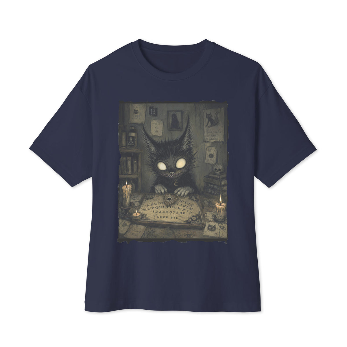 Navy oversized boxy tee with the 'Free Readings' goth graphic: a wide-eyed black cat creature at a Ouija board surrounded by candles