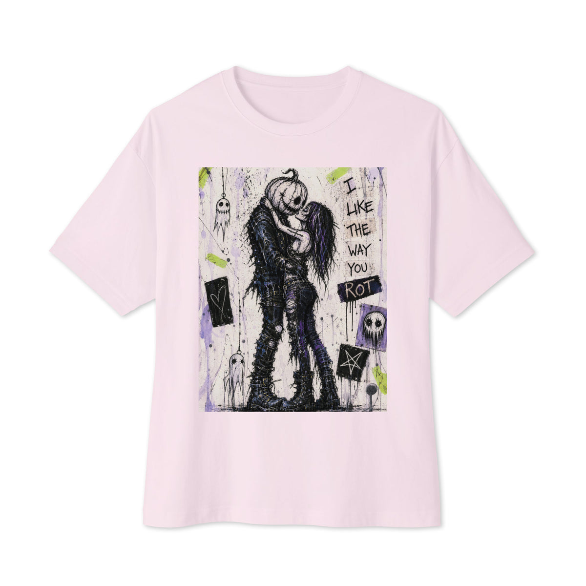 Soft pink oversized boxy tee with the 'I Like The Way You Rot' goth graphic: a pumpkin-headed zombie kissing a purple-haired goth girl, with the words "I like the way you rot"