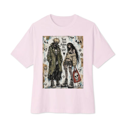 Soft pink oversized boxy tee with the 'Your Skin Awakens My Spirit' goth graphic: a grunge zombie couple standing together, with the words "Your skin awakens my spirit"
