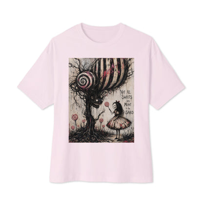 Soft pink oversized boxy tee with the 'Sweet Tooth' goth graphic: a girl with a lollipop facing a creepy candy-striped tree monster, with the words "Not all sweets are meant to be saved"
