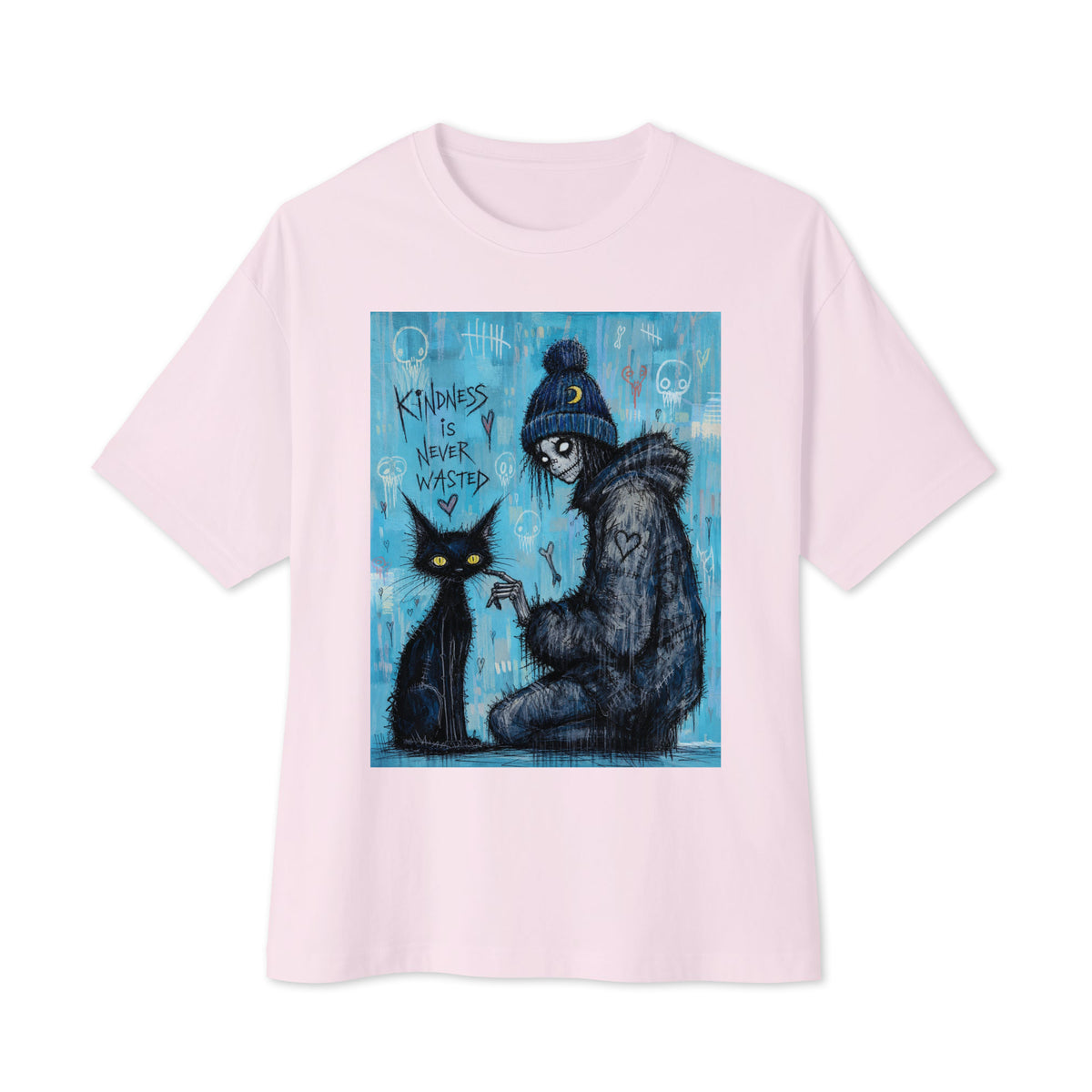 Soft pink oversized boxy tee with the 'Kindness Is Never Wasted' goth graphic: a girl in a moon beanie petting a black cat on a blue background, with the words "Kindness is never wasted"